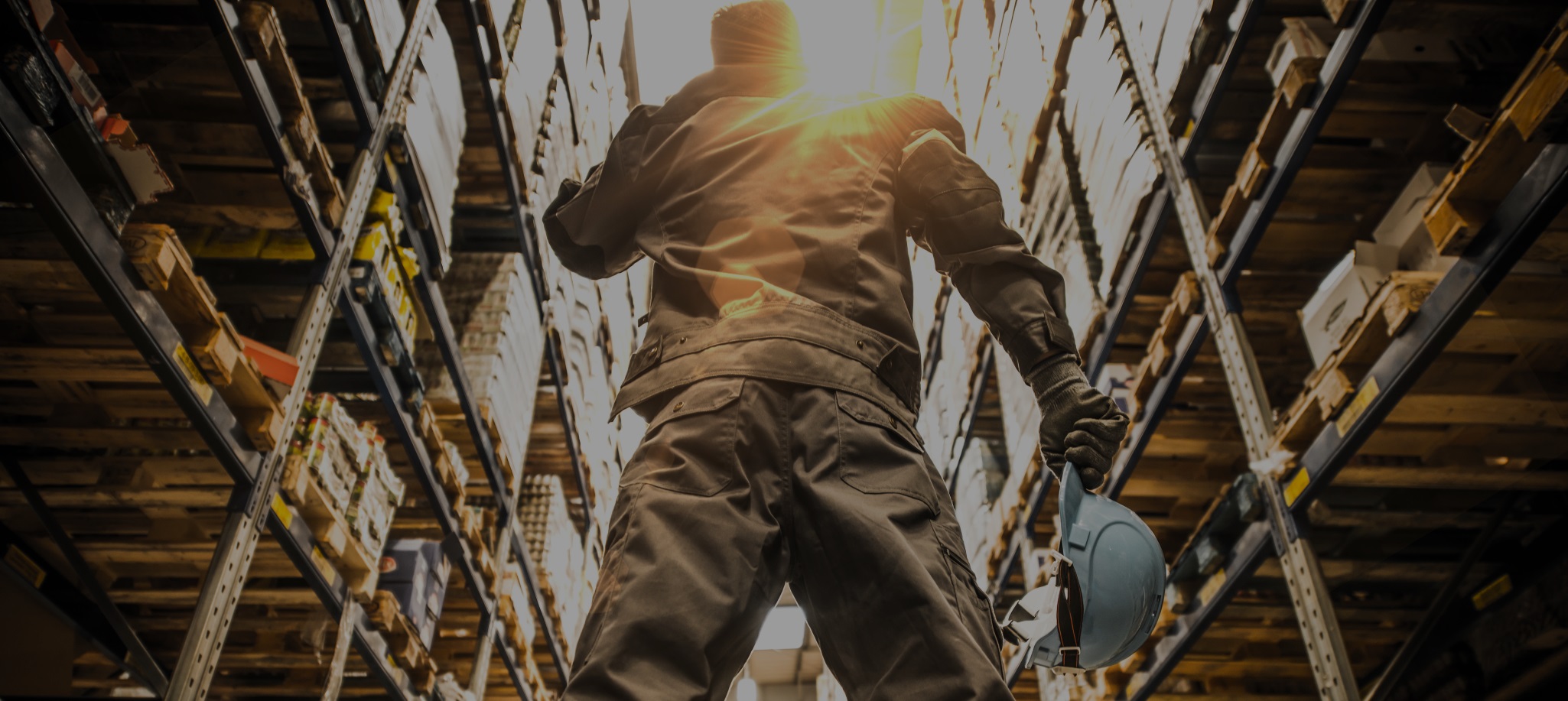 Industrial worker wearing safety footwear in a warehouse