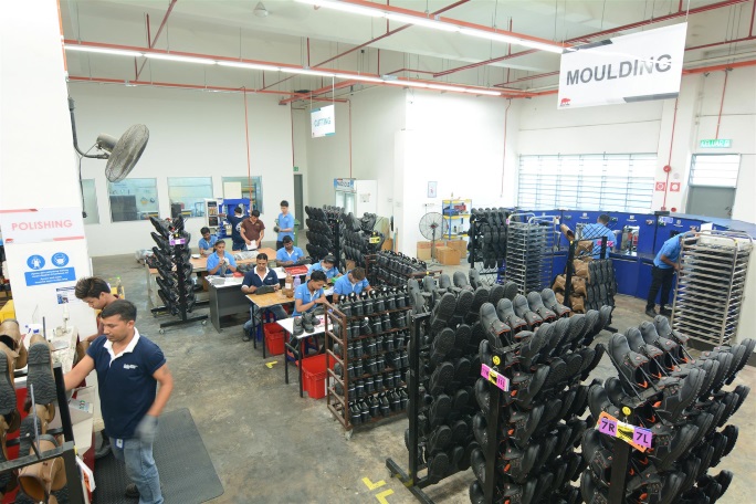 RHINO SHOE team preparing safety footwear uppers in the Malaysian factory