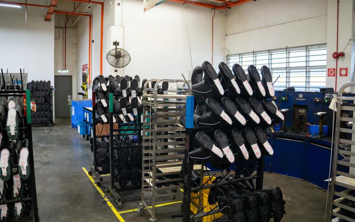 RHINO SHOE safety footwear arranged in organised work-in-progress racks